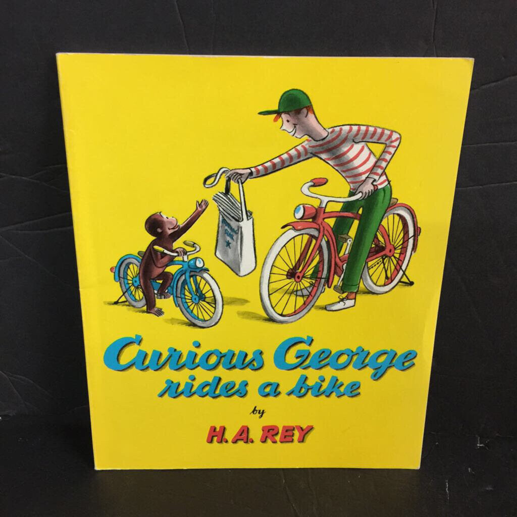 Curious George Rides a Bike (H.A. Rey) -character paperback