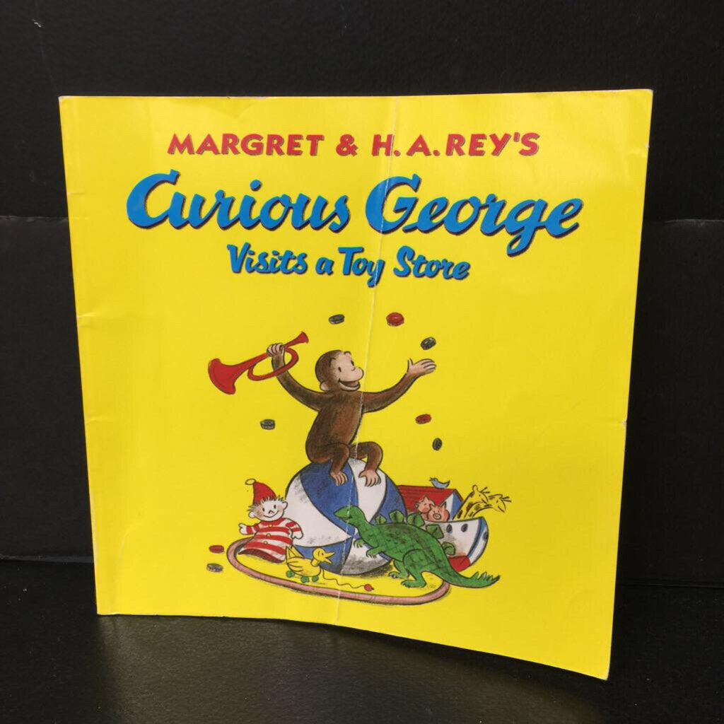 Curious George Visits a Toy Store (Margret & H.A. Rey) -paperback character