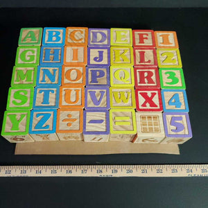 wooden alphabet blocks A-Z, 0-9