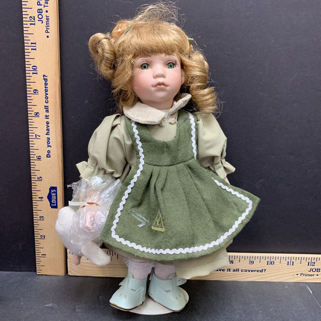 collectible porcelain doll w/ stand