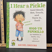 Load image into Gallery viewer, I Hear a Pickle (and Smell, See, Touch, and Taste It, Too!) / Oigo Un Pepinillo (y tambien lo huelo, veo, toco y saboreo!) (In Spanish) (Rachel Isadora) -paperback
