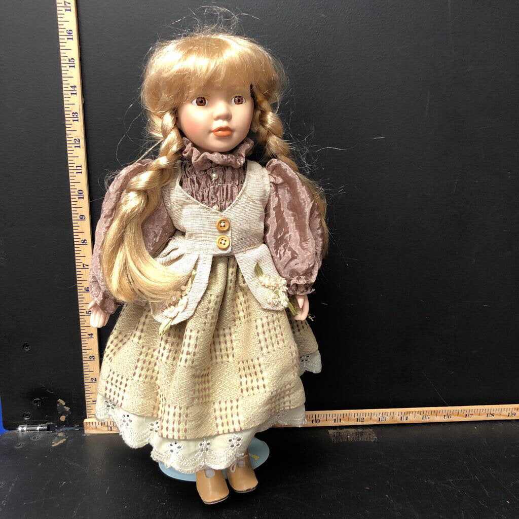 Collectible porcelain Girl doll w/ stand