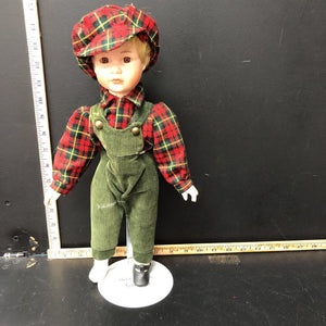 Collectible porcelain boy doll