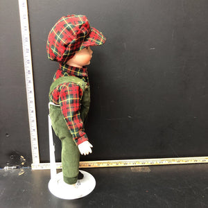 Collectible porcelain boy doll