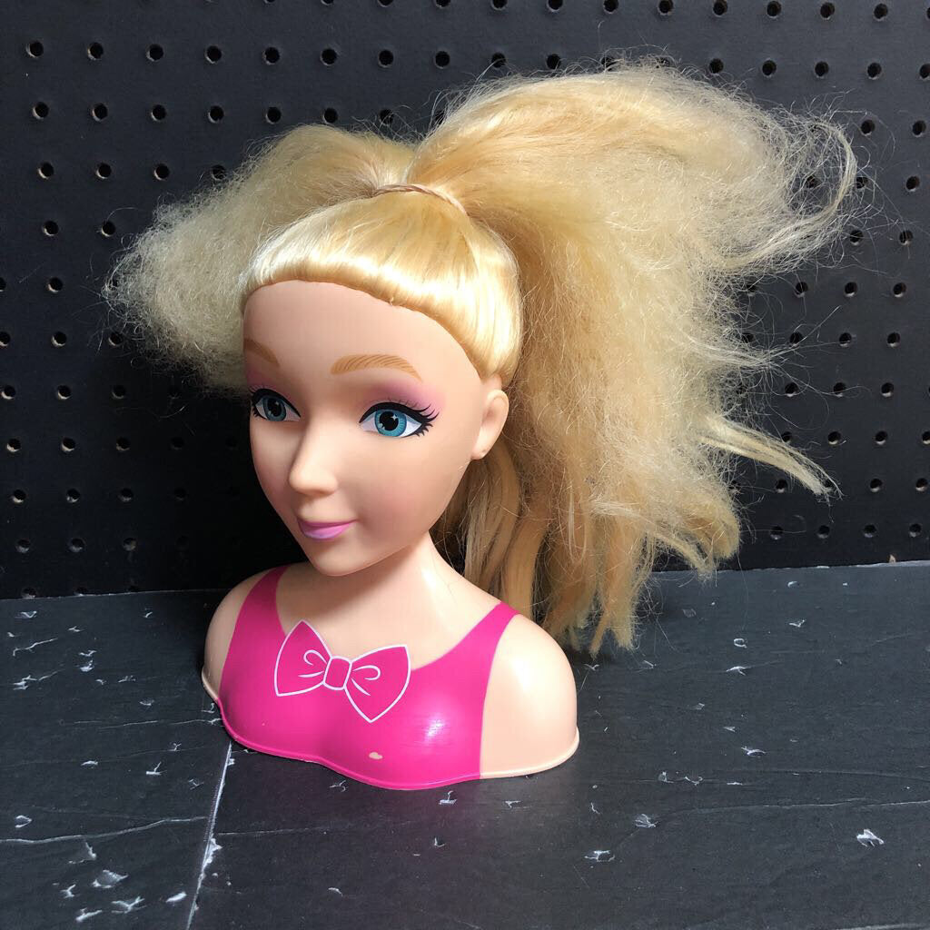JoJo Siwa styling head