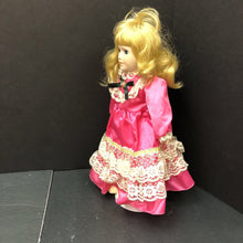 Load image into Gallery viewer, Wind Up Musical Porcelain Doll in Dress w/Stand

