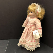Load image into Gallery viewer, Wind Up Musical Porcelain Doll in Dress &amp; Headband w/Stand
