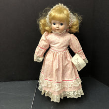 Load image into Gallery viewer, Wind Up Musical Porcelain Doll in Dress &amp; Headband w/Stand
