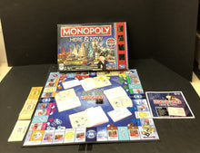 Load image into Gallery viewer, monopoly here and now board game

