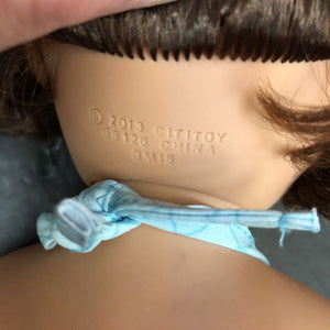 Brunette Doll in Swimwear