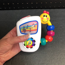 Load image into Gallery viewer, Take Along Tunes Musical Rattle Toy Battery Operated
