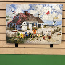 Load image into Gallery viewer, Charles Wysocki "Root Beer Break at the Butterfield's" Jigsaw Puzzle (Buffalo Games)
