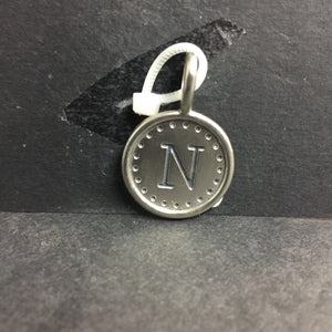 "N" Initial Charm
