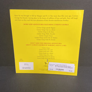 Curious George Goes to a Chocolate Factory (Margret & H.A. Rey) -character paperback