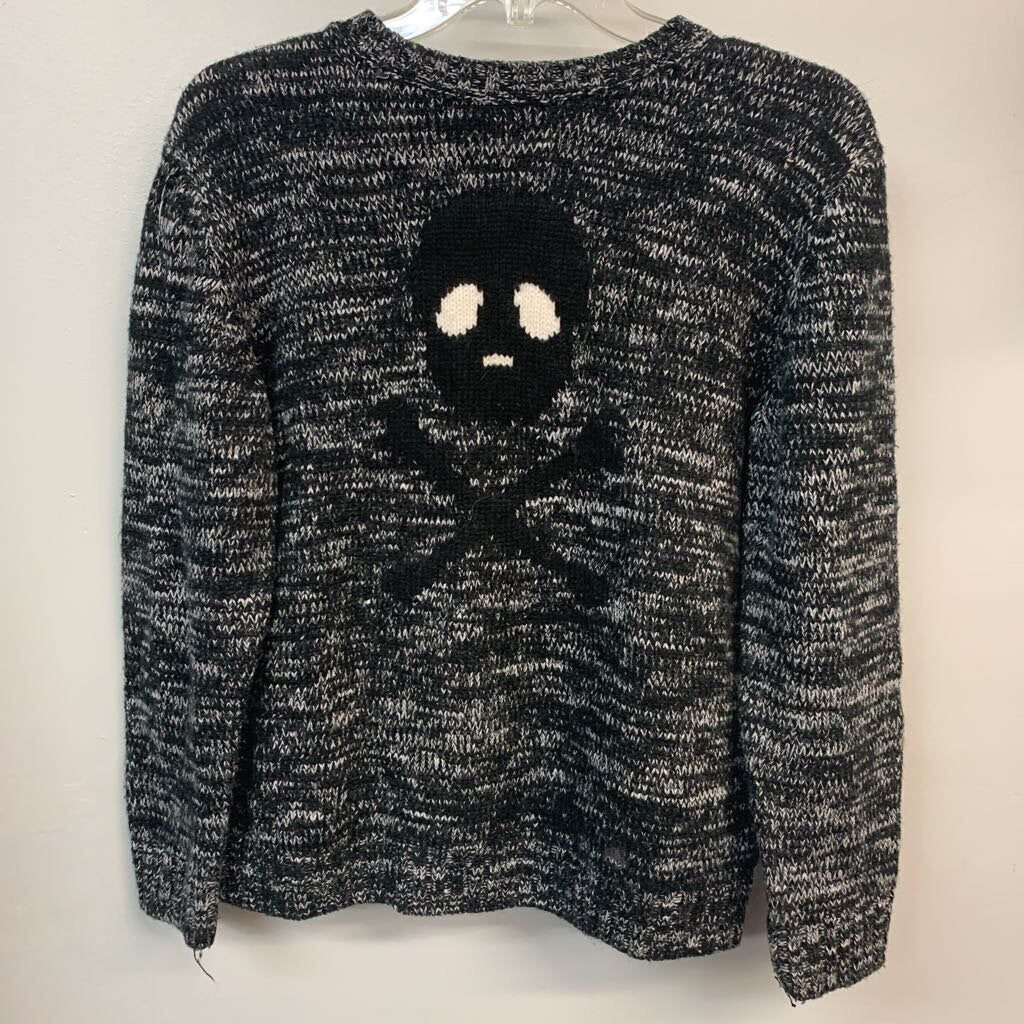 skull & crossbones on knit sweater