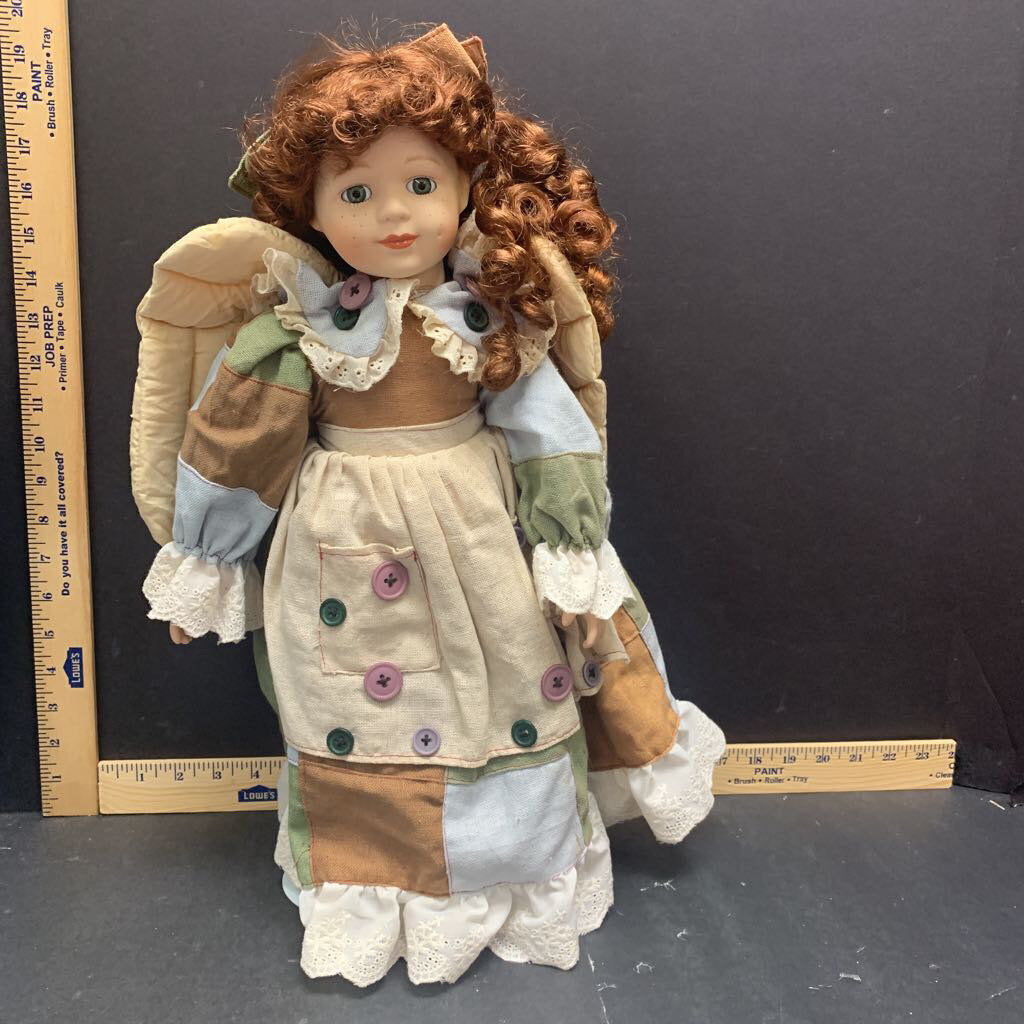 collectible Porcelain doll-angel w/ brown curls