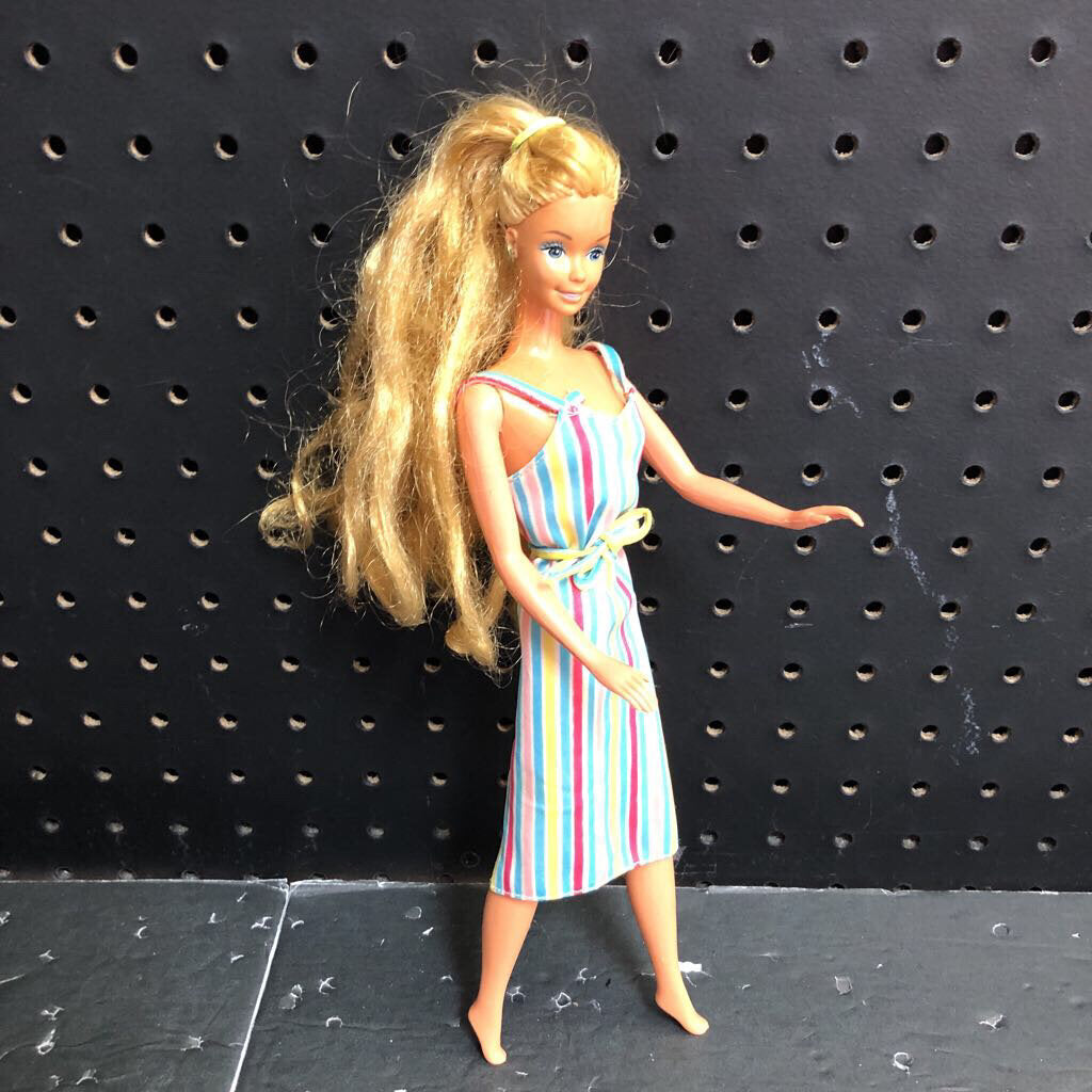 Doll in striped dress 1966 vintage collectible