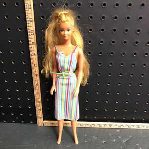 Doll in striped dress 1966 vintage collectible