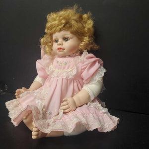 Lifelike Baby Doll in Flower Dress