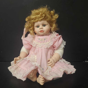 Lifelike Baby Doll in Flower Dress