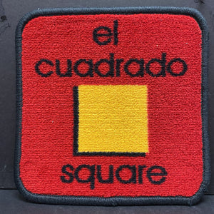 English/Spanish "el Cuadrado"/"Square" Carpet Square